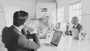 business team analyzing data serious meeting